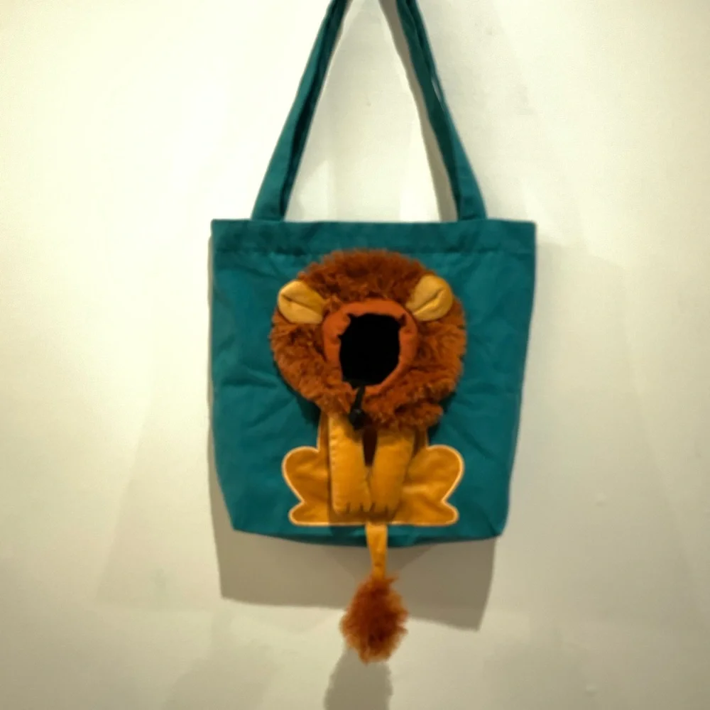 CANVASS SHOULDER LION PET CARRIER W/ ADJUSTABLE OPENING FOR PET HEAD & AIR FLOW.